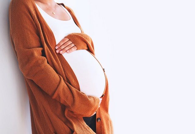 bigstock Close up Pregnant Woman Touchi 200286748