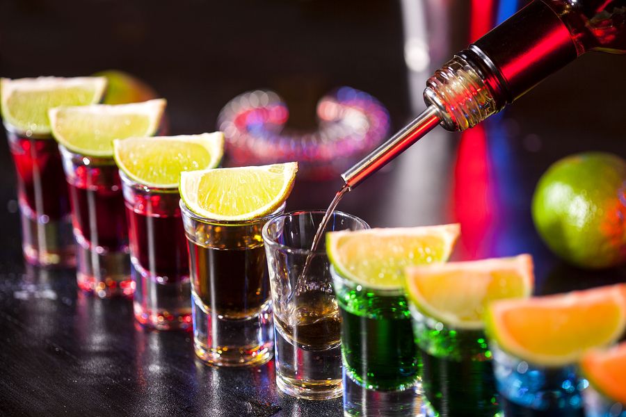 bigstock Bartender Pouring Alcoholic Dr 244385938